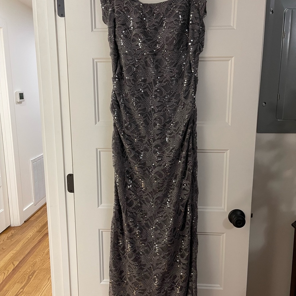 Evening gown by Alex evening wear,Grey with some sequins, fitted but stretchy